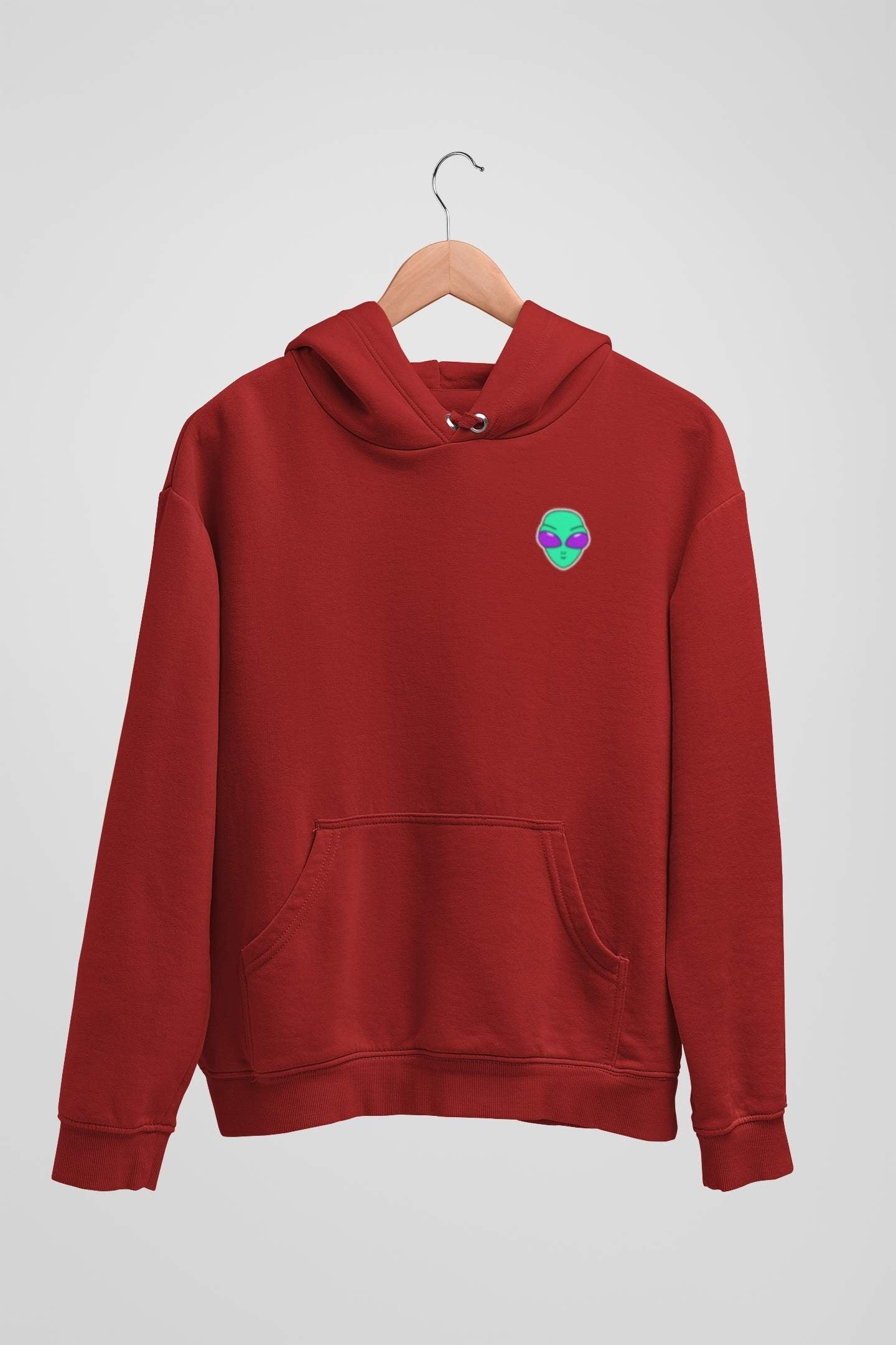 Alienhead Hoodie in red, front view hanging on a hanger showcasing bold alien graphic and relaxed fit