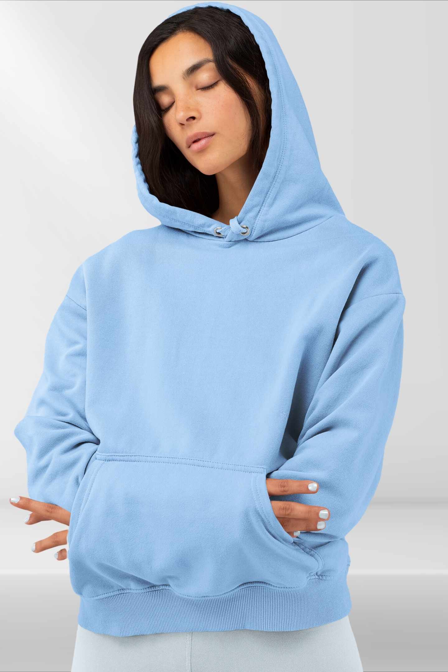 Classic Hoodie in baby blue, front view worn by female model showcasing relaxed fit and premium fabric