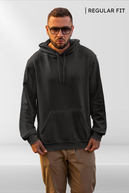 Classic Hoodie in black, front view worn by male model showcasing relaxed fit and premium fabric